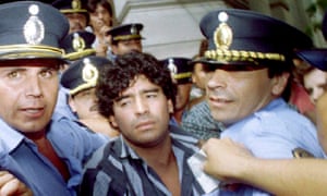 Maradona leaves a courthouse in March 1994 after answering charges of shooting and injuring journalists outside his country home in Mercedes, 100km from Buenos Aires.