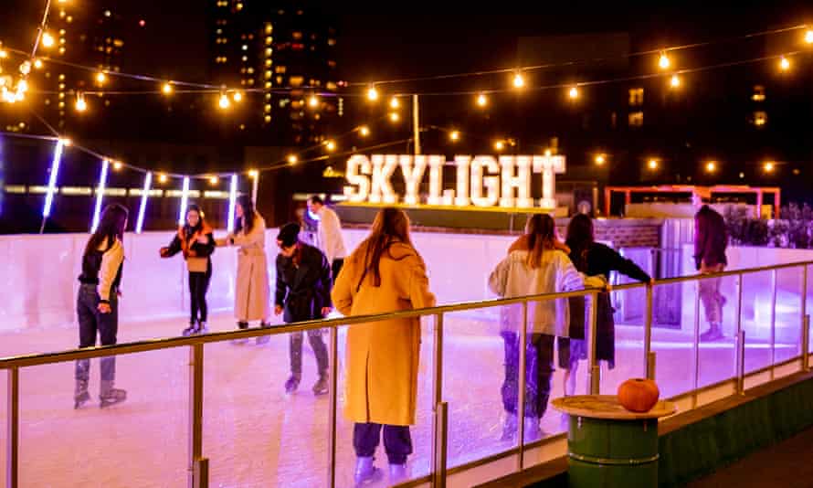Skaters on Europe’s only rooftop rink at London’s Tobacco Dock.