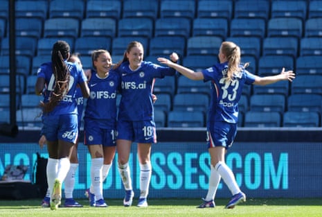 Chelsea's Johanna Rytting Kaneryd celebrates scoring their first goal teammates