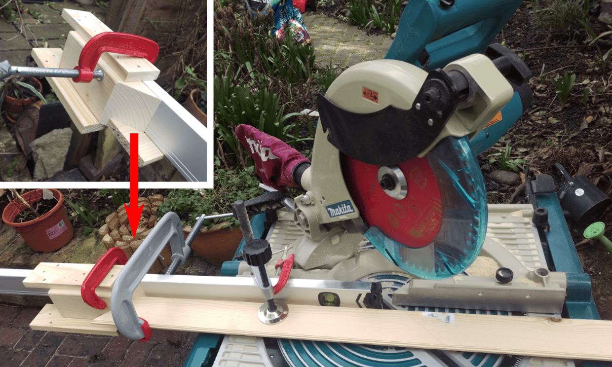 Cutting lengths of the mirror frame with a jig so that they’re exactly the same length - here the far end of the piece rests up against the fixed stop. Using a ruler and pencil to mark length would only get you half-millimetre accuracy at best - not good enough for tidy frame joints.