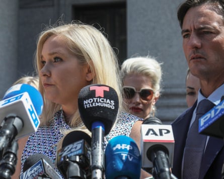 Virginia Roberts GiuffreFILE - Virginia Giuffre, center, holds a news conference outside a Manhattan court in New York, Aug. 27, 2019. (AP Photo/Bebeto Matthews, File)