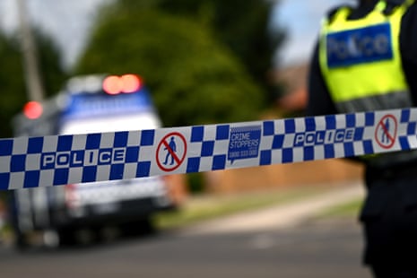 Victoria police tape restricts access to a crime scene