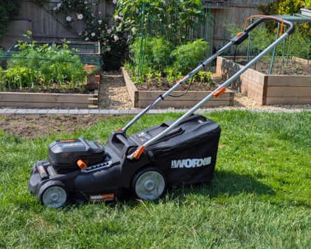 A Worx lawnmower in a garden