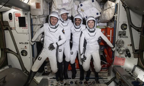 European Space Agency astronaut Matthias Maurer and Nasa astronauts Tom Marshburn, Raja Chari and Kayla Barron pose during a fit check onboard the International Space Station's Harmony module.