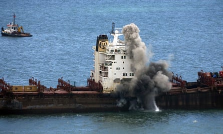 Explosives are detonated in an attempt to break the cargo ship MSC Napoli near Branscombe, England, July 2007.