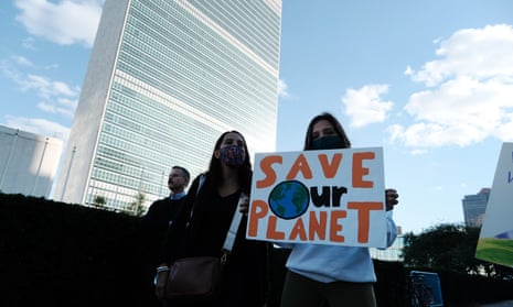 Students take part in a climate protest in New York City. A study using artificial intelligence has predicted that the Earth is on track to warm 1.5C in the next decade.