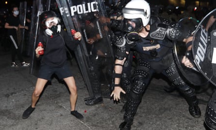 Atlanta police clash with a demonstrator during a protest on 2 June in Atlanta.