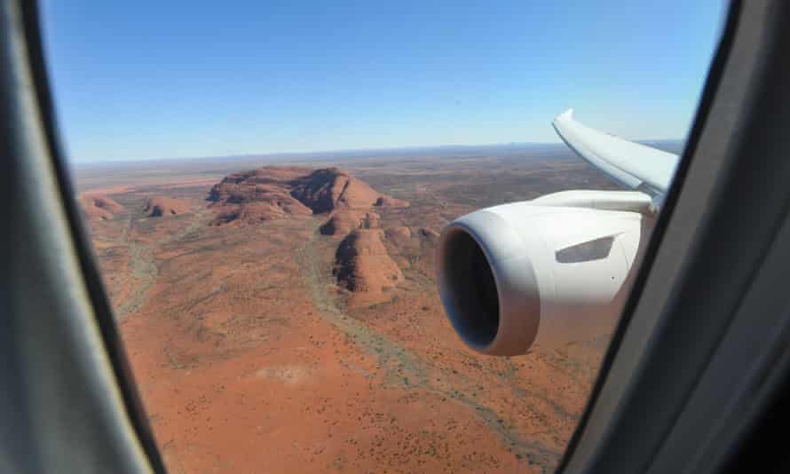 Dreamliner aircraft flies close to Kata Tjuta in the NT.