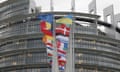 European flags fly outside the European Parliament in Strasbourg where an employee’s office was raided.