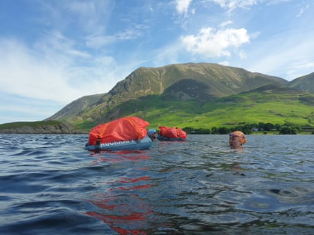 Cross-country swimmers on Crummock Water