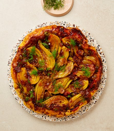 Yotam Ottolenghi’s caramelised fennel and grape tart tatin with saffron and olives.
