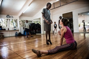 Cooper Rust, the artistic director at Dance Centre Kenya, says there is not much difference in skill between the kids who train at her studio and those in Kibera. Here she is working with Dickens, 13, on his dance