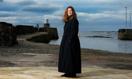 Julie Brooks ,who was once shot by a sniper, seen by a harbour near her home in Scotland