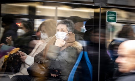 People on a bus in Spain wearing face masks