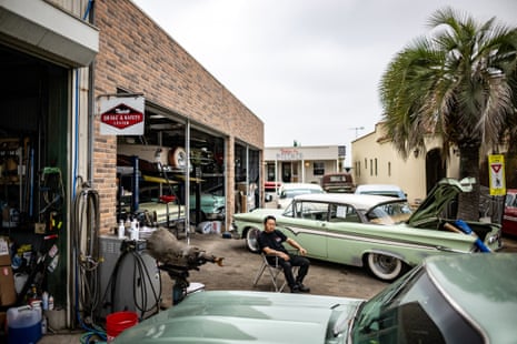 Yosuke Fukuda, the owner of US car dealer Y-Tech, sitting at his company in Fukaya of Saitama Prefecture.