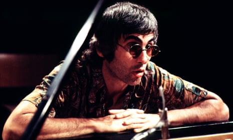 Paul Bley leaning on piano
