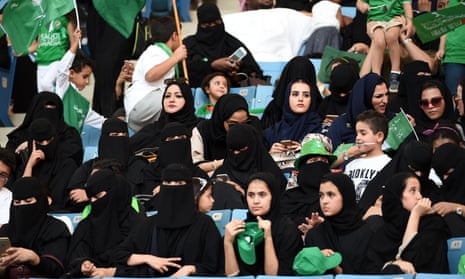 Saudi women sit for the first time in the King Fahd stadium as the country celebrated national day on 23 September. 