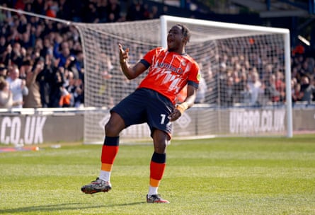 Ruddock Mpanzu celebrates after scoring in the victory over Blackpool at Kenilworth Road in April.