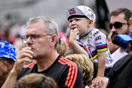 A young fan of Tadej Pogacar of UAE Team Emirates pictured at the start of stage 14.
