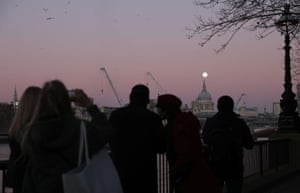 Wolf moon rises over St Paul’s Cathedral in London