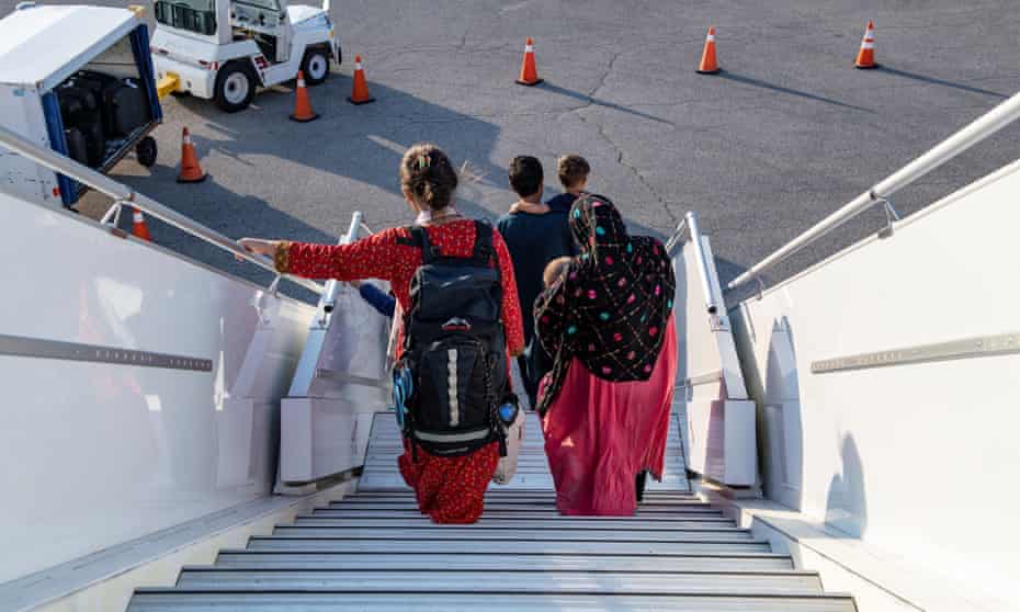 File photo of refugees arriving at Toronto airport in Canada