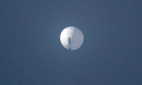 A photo shows a suspected Chinese spy balloon in the sky over Billings, Montana.