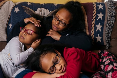 Kaiesha Rivers, center, comforts daughters Taiyla Young, 5, and Jyahri Pye, 11, during a portrait session on Sunday, Jan. 27, 2019 at a relative’s house in Highland Park, Mich. Rivers had Jyahri at 32 weeks. 