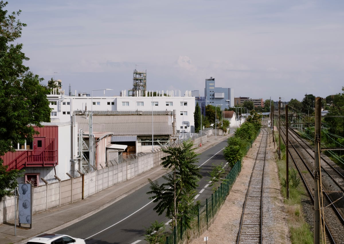 Industrial building alongside railway tracks
