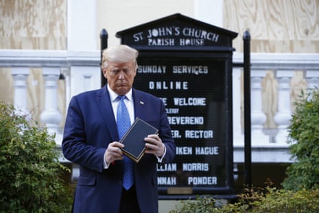 President Donald Trump holding a Bible during a visit outside St. John's Church across Lafayette Park from the White House in Washington.