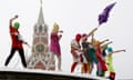 Members of the Russian radical feminist group 'Pussy Riot' stage a protest performance in Red Square in Moscow<br>Members of the Russian radical feminist group 'Pussy Riot' sing a song at the so-called Lobnoye Mesto (Forehead Place), long before used for announcing Russian tsars' decrees and occasionally for carrying out public executions, in Red Square in Moscow January 20, 2012. Eight activists, who were later detained by police, staged a performance to protest against the policies conducted by Prime Minister Vladimir Putin. REUTERS/Denis Sinyakov (RUSSIA - Tags: POLITICS CIVIL UNREST SOCIETY)