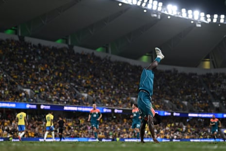 Nestory Irankunda celebrates scoring for the Socceroos against Brazil