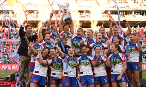 The Newcastle Knights celebrate their 2022 NRLW grand final victory a year after finishing last season as wooden spooners.