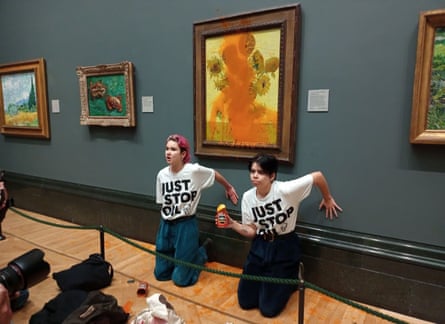 Just Stop Oil protesters after throwing tomato soup at Vincent van Gogh’s Sunflowers at the National Gallery in London, UK, October 14 2022