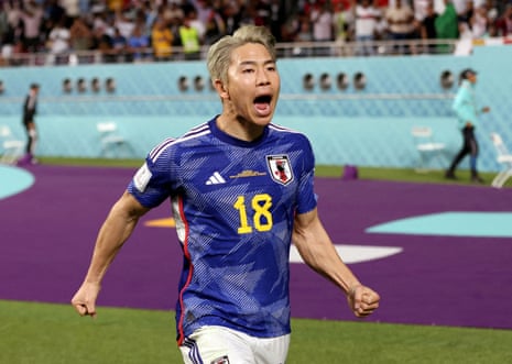 asano celebrates scoring for japan against germany 