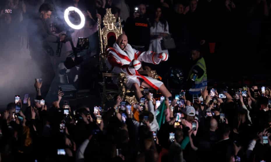 Tyson Fury sits on a gold throne before heading to the ring, where he put on a suitably imperious display.