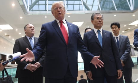President Donald Trump talks to the media with South Korean President Moon Jae-in, right, and Secretary of State Mike Pompeo, rear left, at the border village of Panmunjom in the Demilitarized Zone, South Korea, after meeting Kim Jong Un. (AP Photo/Susan Walsh)