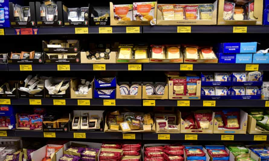A range of cheese on display in Aldi.