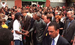 Blacker meets Nelson Mandela in Brixton at the end of his state visit to Britain in 1996.