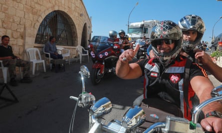Motorcyclists from Syria, Lebanon, and Jordan take part in a ride to encourage tourism through the town of Saidnaya, north of Syria’s capital Damascus, in September.
