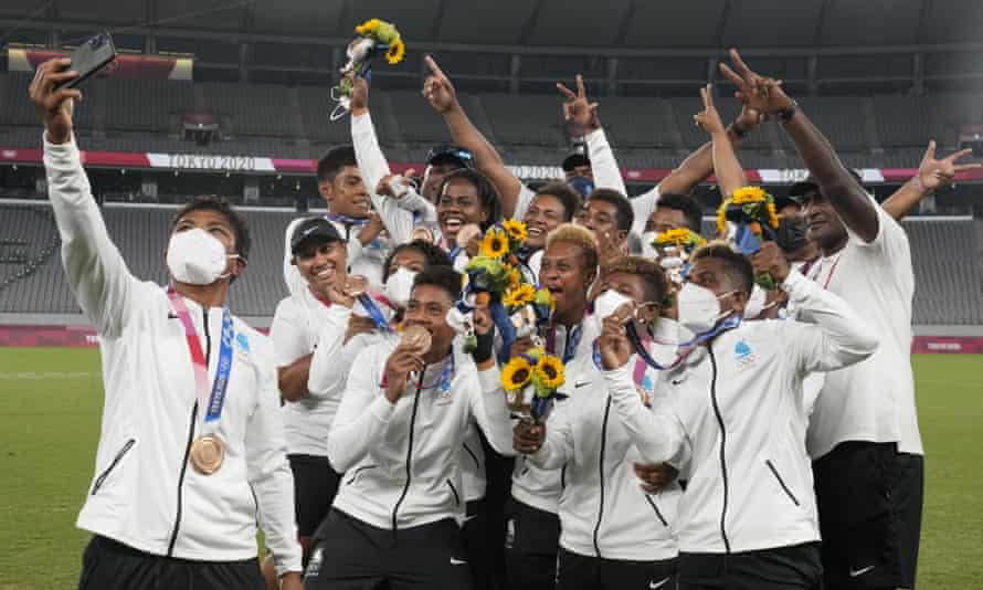 Fijiana, the women’s rugby sevens team, celebrate with their bronze medals