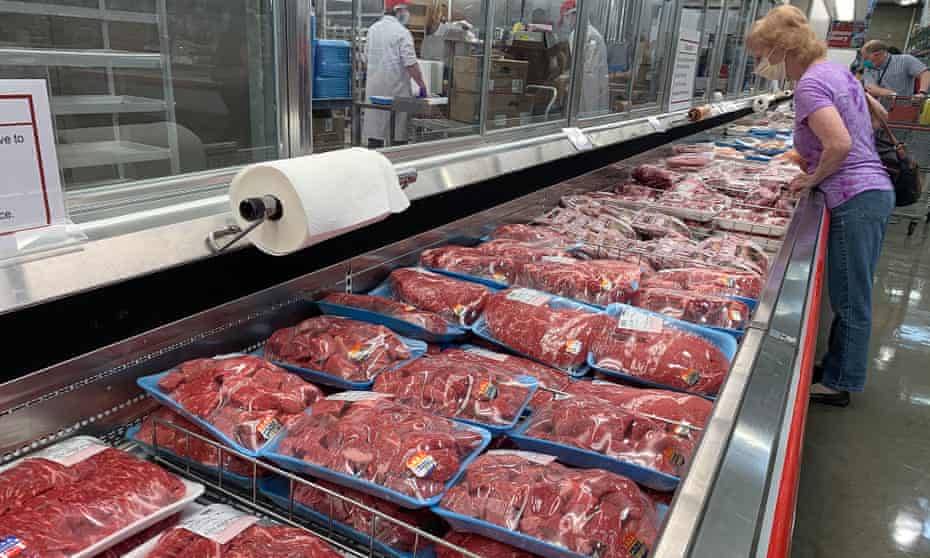 Shoppers view prime and choice meat selections in the meat department at a Costco in Vacaville, California.
