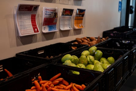 Flyers hanging above crates of producer
