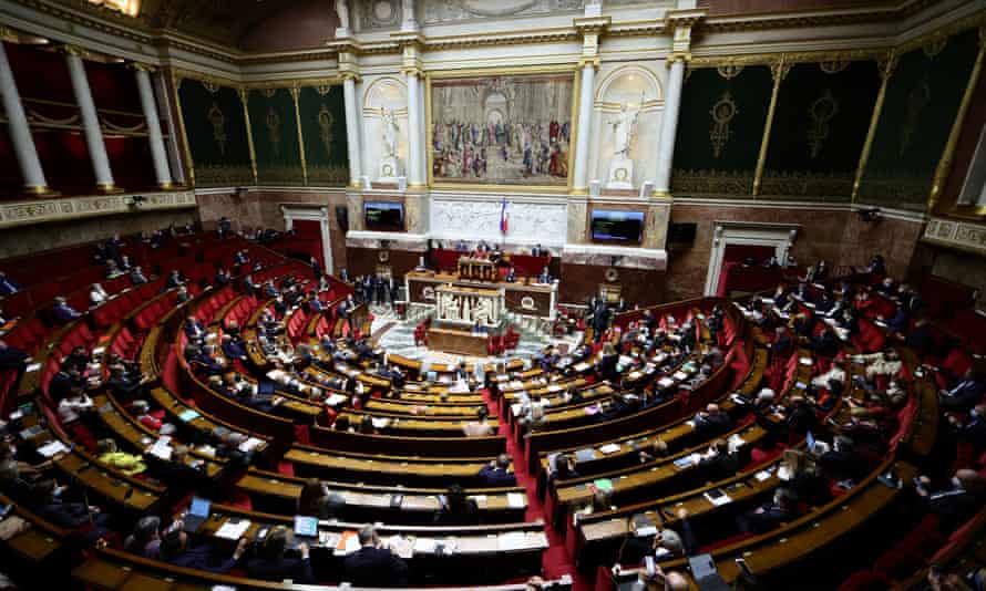 French lawmakers discussing the vaccine pass bill at the National Assembly in Paris.