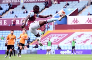 Aston Villa’s Mbwana Samatta attempts to control the ball in the air.