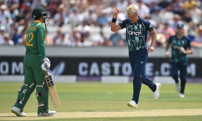 England's Sam Curran celebrates after dismissing South Africa's Quinton de Kock.