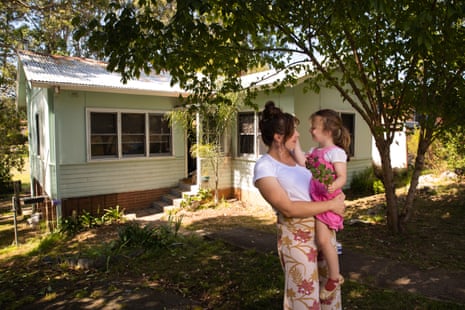 Alex Scott and daughter Prudence, four, at their newly purchased home in Bega