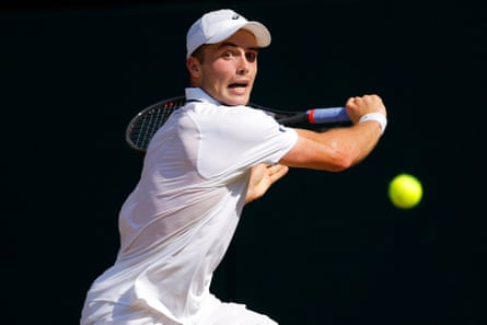 Arthur Fery hits a backhand shot against Flavio Cobolli during their men’s singles quarter-final match of Wimbledon 2026
