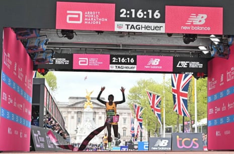 Peres Jepchirchir crosses the line to win the women's race in a world record time.