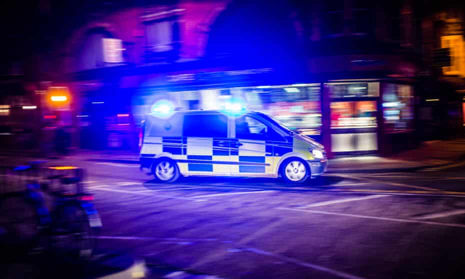 Emergency service ambulance with blue lights flashing