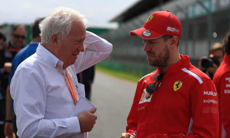 Charlie Whiting talks to the Ferrari driver Sebastian Vettel during preparations for Sunday’s Melbourne Grand Prix.